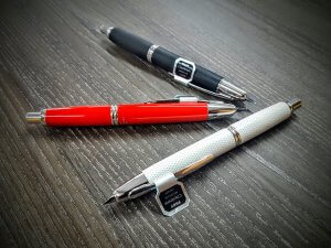 Red, White and Black Capless Pens