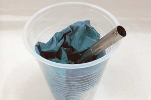 Place nib in cup with paper towel